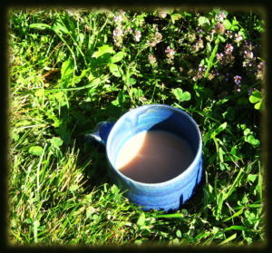 handmade pottery mug filled with chai tea