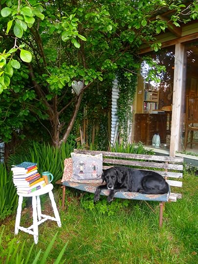 On the bench outside the studio