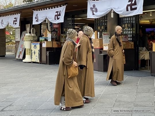 monks shopping outside Niomon Gate at Zenkoji Temple in Nagano City, Japan