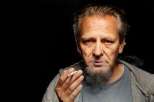 older man smoking