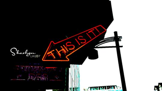 neon sign showing this is it pointing out what you can discuss with employees about COVID19