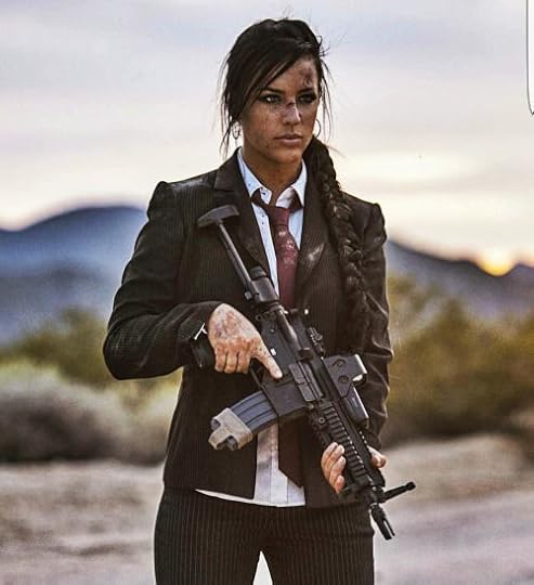 A lady, a suit and a whole lot of machine gun power