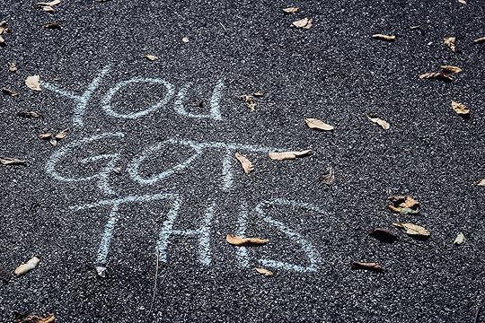 The words you got this written in chalk on street asphalt