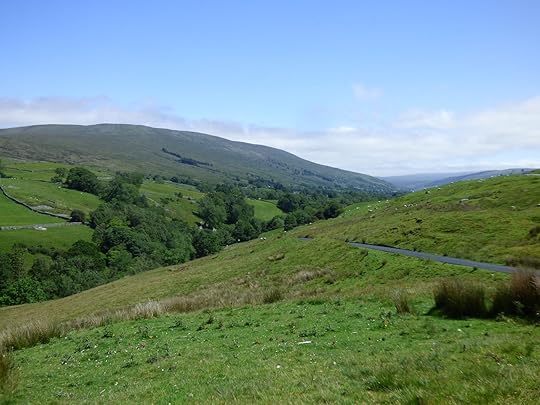 Image may contain: mountain, sky, cloud, tree, plant, grass, outdoor and nature