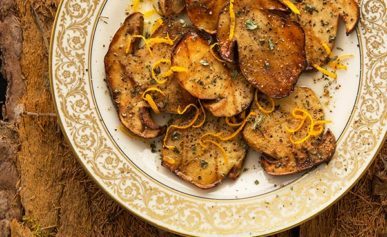 grilled porcini mushrooms on a plate.