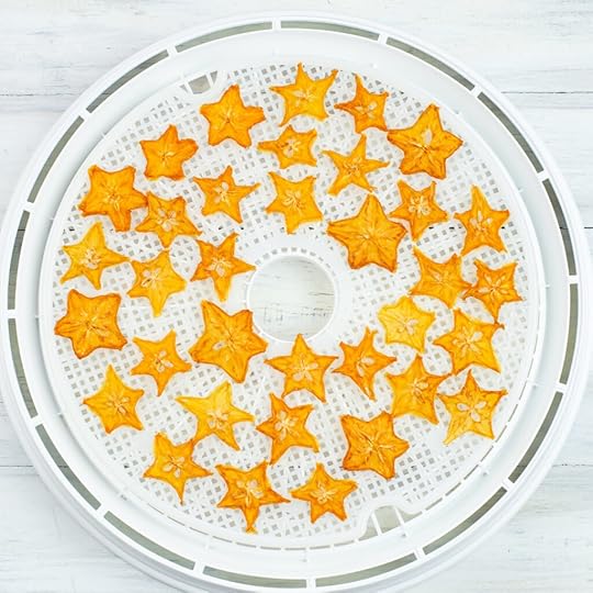 Dehydrating Star Fruit on a dehydrator drying tray