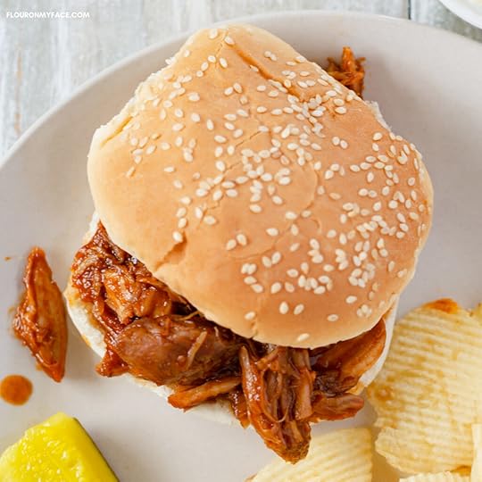 Pulled Pork Sandwich served with chips, coleslaw and a pickle wedge.
