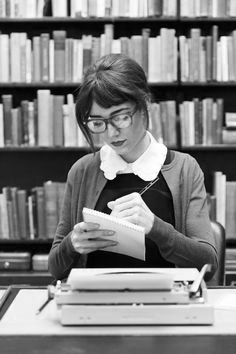 Image may contain: 1 person, sitting