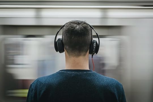 Man with headphones on to show combination of activies for a morning routine