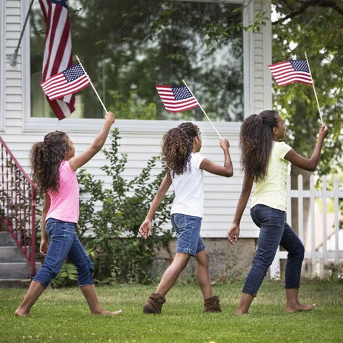 Three girls with American flags