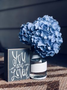Flower and sign, you are loved