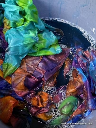 tie-died cloths in rinse bucket at Geocolor: Hachimantai Geothermal Dyeing in Hachimantai city, Japan