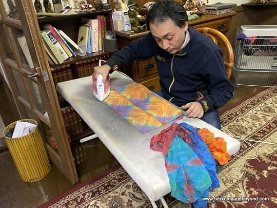 instructor irons student projects at AlpenRose cafe at Geocolor: Hachimantai Geothermal Dyeing in Hachimantai city, Japan