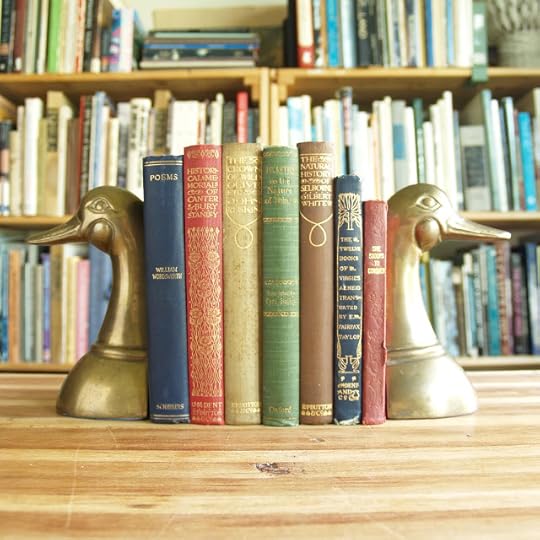 Friday giveaway: seven antique books in multicolored bindings