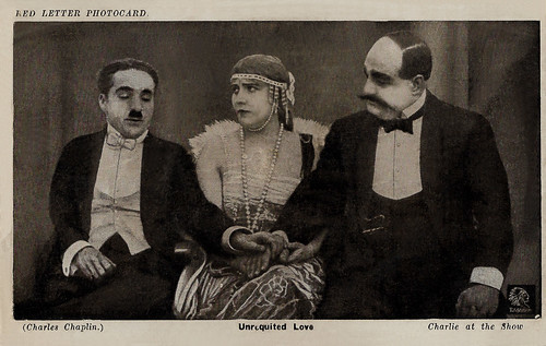 Charlie Chaplin, Edna Purviance and George Cleethorpe in A Night in the Show (1915)