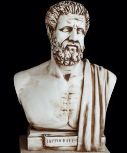 Antique doctor Hippocrates - ancient Greek physician and healer. Portrait of Hippocratic, isolated on black. He known in science as 'Father of Medicine' and author of famous 'Hippocratic Oath'.