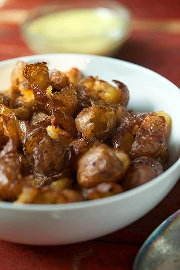 These potatoes are brined, smoked, and then deep-fried to achieve shatteringly crisp skin and meltingly tender interior. #potatoes #smoker #crispy #sidedishrecipes