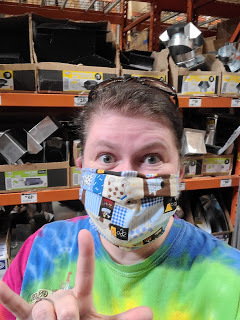 Nancy in Home Depot, wearing a mask