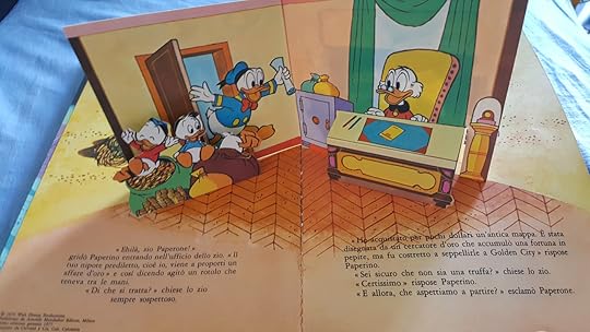 Paperino e il fantasma di Golden City un bilibro animato. by Walt