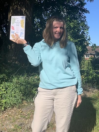 Here I am with a copy of my new book, The Reluctant Allergy Expert