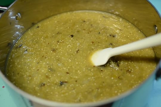 Pureed tomatillos, onions, jalapenos, cilantro, lime juice, salt, and pepper in a saucepan.