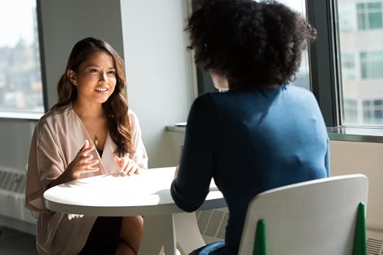 Two Girls Talking