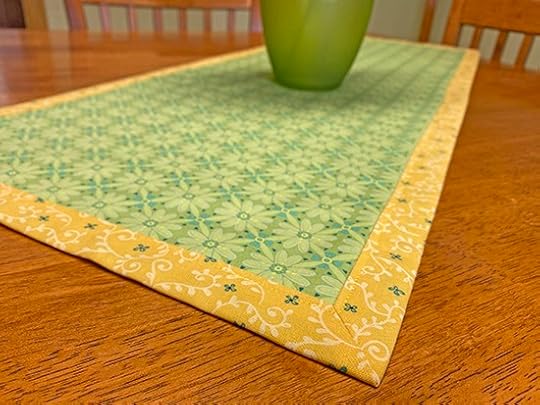 Learn How to a No-Hassle Table Topper Table Runner with Mitered Corners with our No-Hassle Table Topper Sewing Tutorial at The Nancy Zieman Productions Blog. 