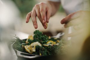 spinach in hands