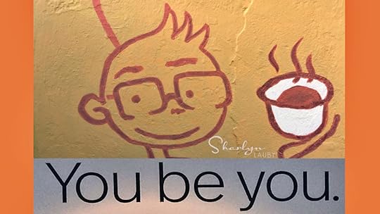 wall art employee toasting with coffee cup after completing self appraisal