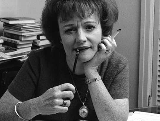 Cigarette, nibbled pencil, stacked books: the signifiers of authorship used to be so much easier….