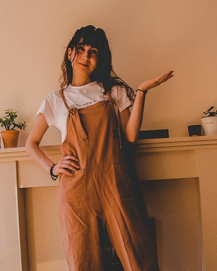 Me wearing a minimalist tee with dungarees