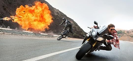 Tom Cruise doing something in Mission Impossible.