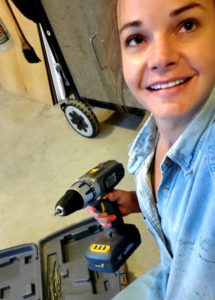 Vintage camper renovation, Melinda and power drill