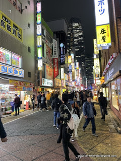 bright lights on Shinjuku streets in Tokyo, Japan
