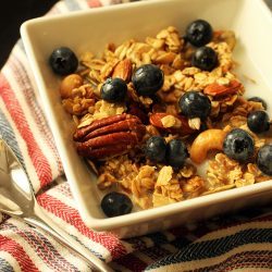 maple granola in bowl on striped napkin