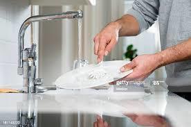 2,049 Man Washing Dishes Photos and Premium High Res Pictures - Getty Images
