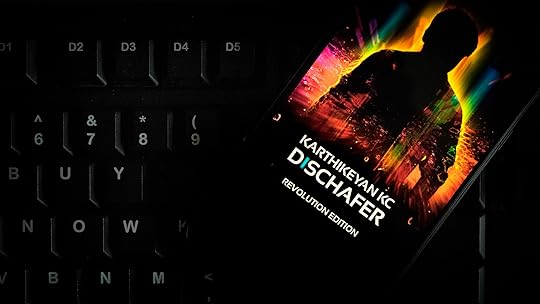 Photograph of Dischafer, a science fiction novel by Karthikeyan KC on a keyboard with a subliminal message of 'Buy Now' instead of the actual keys.