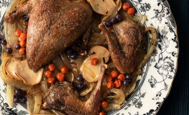 Pan roasted ptarmigan with mushrooms and northern berries.