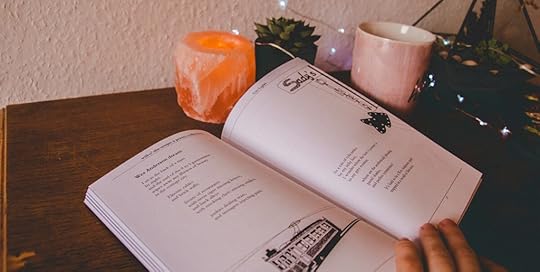 Open book showcasing a unique poetry layout