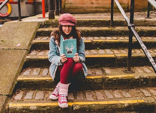 Me reading poetry whilst travelling