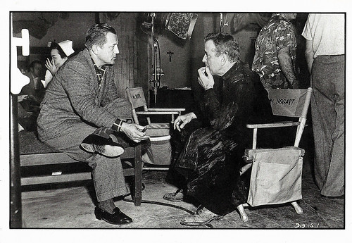 Edward Dmytryk and Humphrey Bogart on the set of The Left Hand of God (1955)