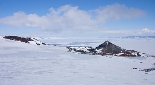 In the other direction, we were even higher than Observation Hill, so you can get a good sense of the whole south end of McMurdo Sound. From left to right: Crater Hill (foreground), White Island (background), The Gap and Observation Hill (FG), Minna Bluff (very faint BG above Ob Hill) and Black Island (BG). You can see how icy the snow is up here, which encouraged some care in moving about.