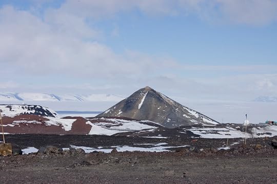 The different shades of volcanic rock on the Hut Point Peninsula had surprised me, and something about the light or the angle up here made them show up better on film, so here is a closer shot where you can see a bit better. Just off the shoulder of Observation Hill there is some faint scarring in the ice …