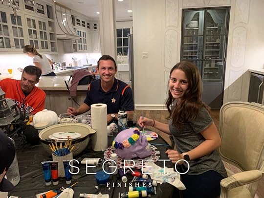 Family painting the halloween craft