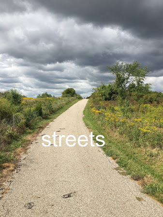 Photo of a paved trail and the caption "street"