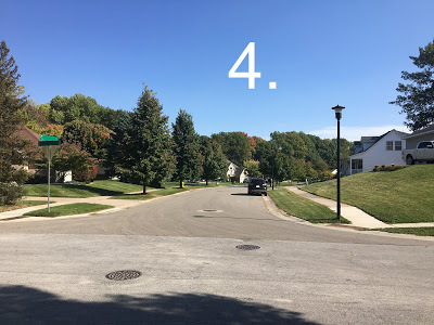 Photo of a street, with the caption "4"