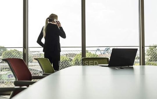 Young businesswoman in conference room on cell phone — Accessibility, job - Stock Photo | #179051270