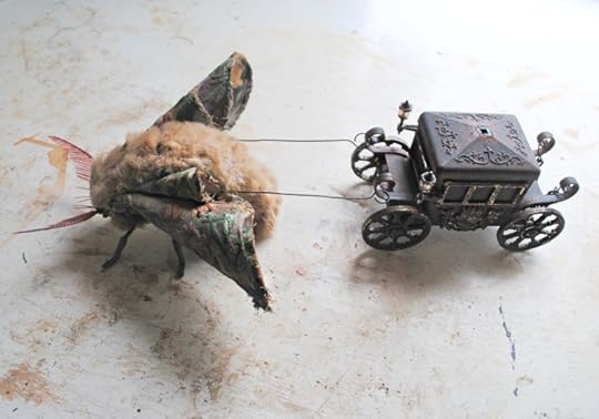 Moth Pulling a Tiny Coach by Mr Finch