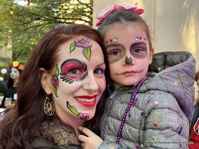 faces painted for the Day of the Dead/Dia de los Muertos festival in San Antonio, Texas