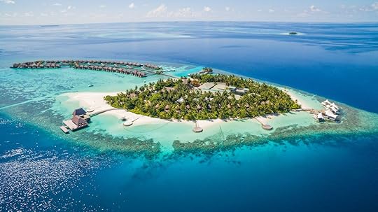 Aerial view of the Maldives archipielago with luxury bungalows